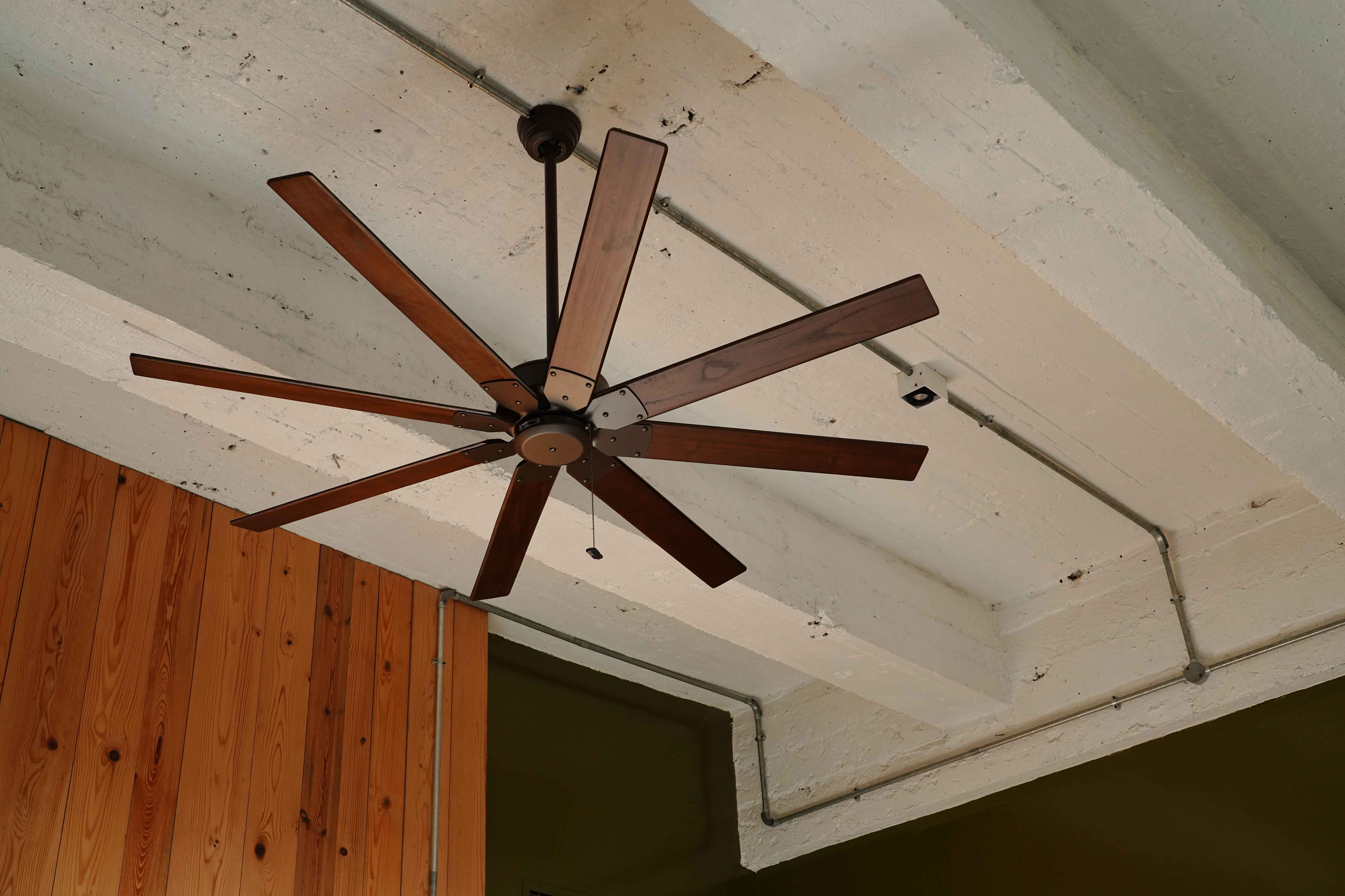 stamba hotel terrace room with wooden ceiling fan